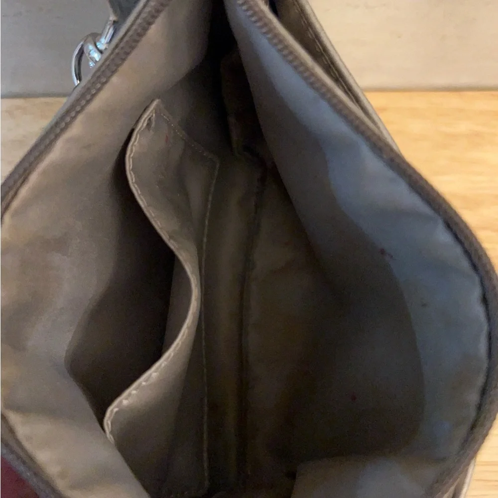 Coach metallic leather wristlet clutch purse.